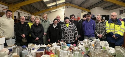 Sustainability 8 group photo in front of homeware products